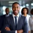 business-people-office-concept-smiling-african-american-businessman-with-crossed-arms-office-background-african-american-businessman-boss-with-group-ai-generated_538213-8193